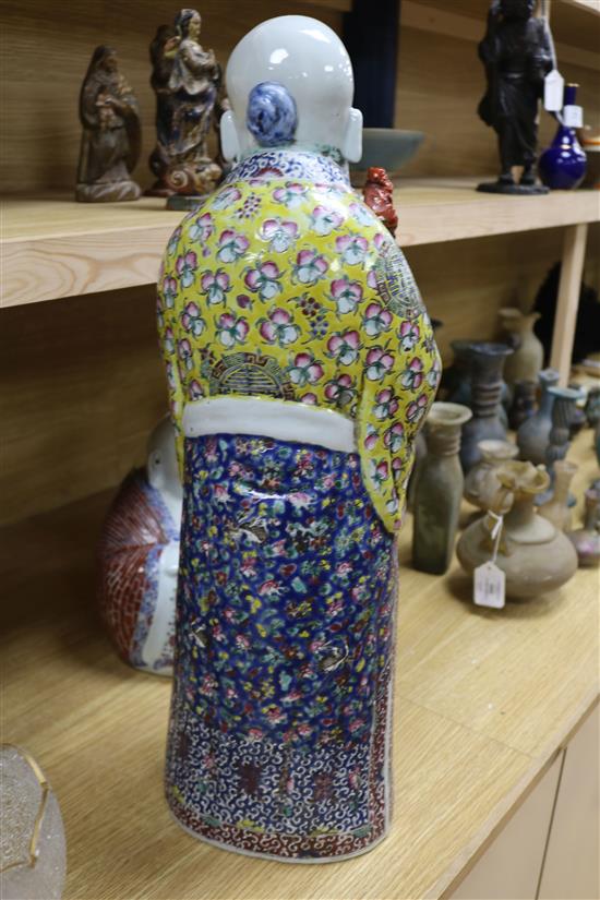 A large Chinese famille rose figure of Shou Lao and a similar figure of Budai tallest 61cm